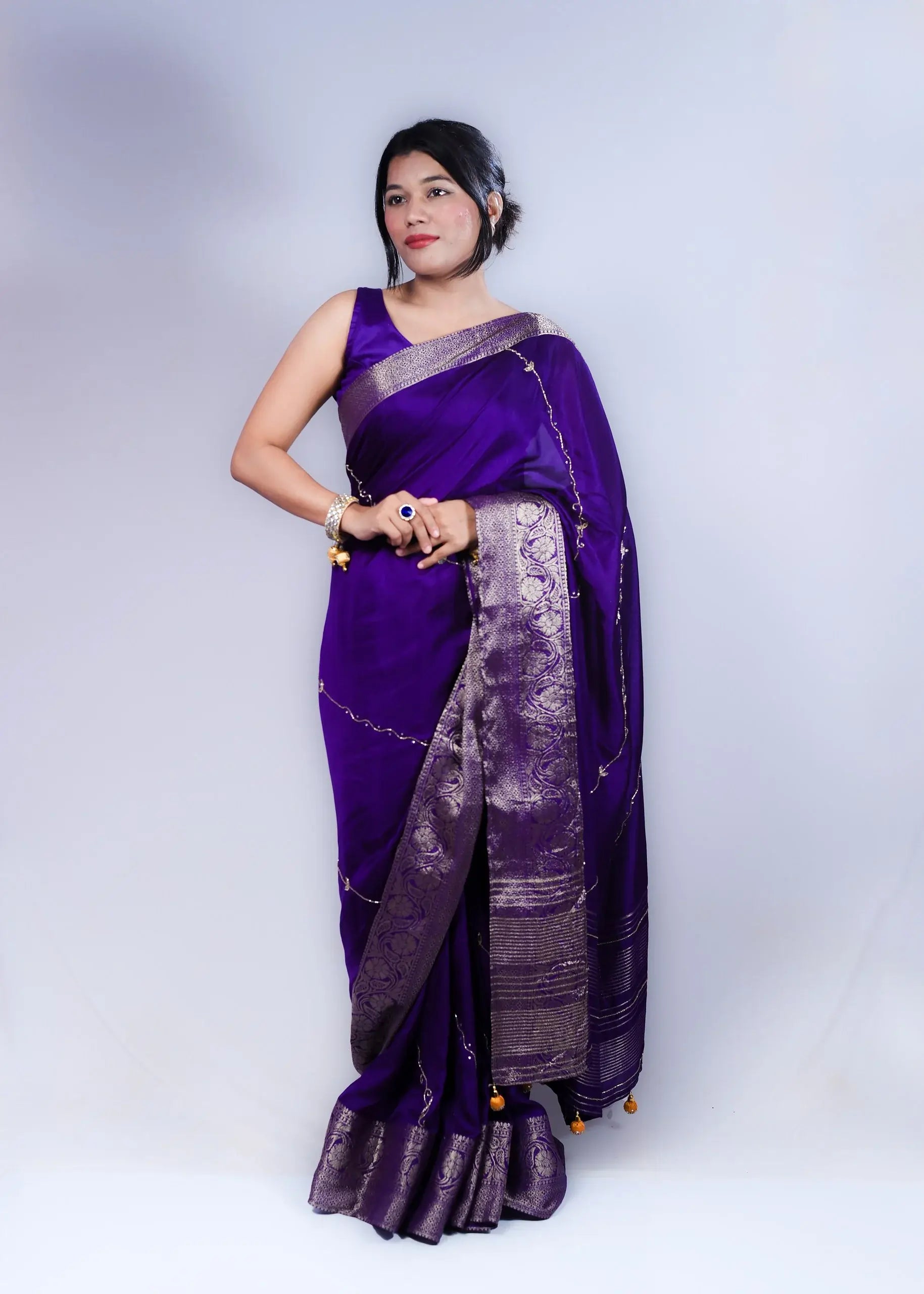 Royal Purple Dola Silk Saree with Intricate Zari Border and Designer Weave